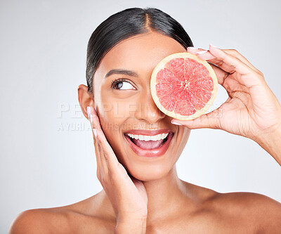Buy stock photo Grapefruit, excited and woman with fruit, beauty and facial with natural skincare isolated on white background. Wellness, vegan cosmetic product and glow, shine and vitamin c with citrus in studio
