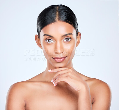 Buy stock photo Studio portrait of Indian woman for dermatology, skincare and cosmetics for salon aesthetic. Beauty, spa and face of isolated person for wellness, satisfaction and facial glow on white background