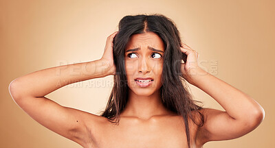 Buy stock photo Hair loss, stress and woman with crisis, disaster and hairdresser fail in studio on brown background. Natural, frustration and shocked person, messy and tangled treatment for haircare and girl