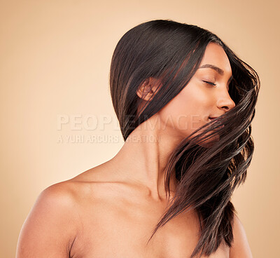 Buy stock photo Hair care, beauty and woman shake head in studio isolated on a brown background. Hairstyle, natural cosmetics and model in salon treatment for texture growth, balayage and aesthetic for wellness.