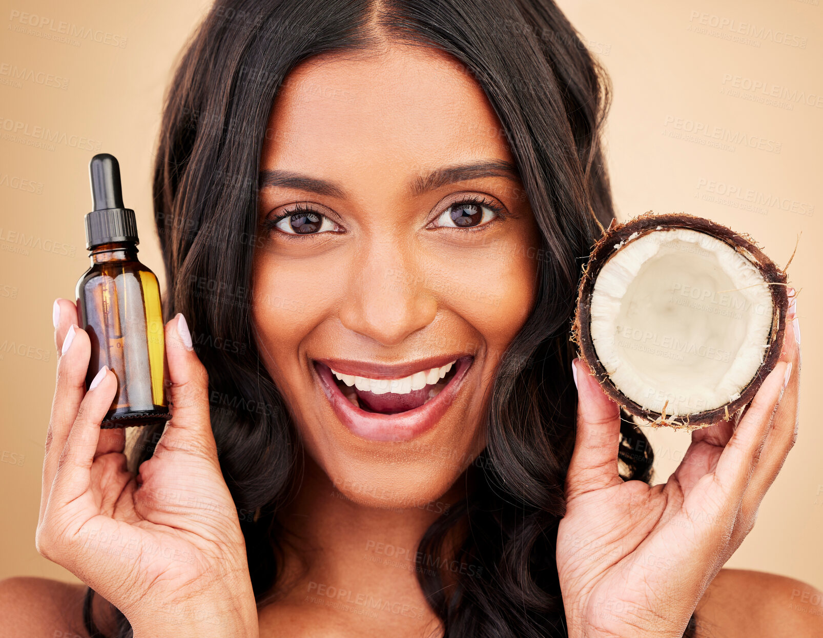 Buy stock photo Hair, woman and coconut oil, beauty and cosmetic care with wellness and treatment in portrait on studio background. Haircare, fruit and shine with texture and growth, natural liquid product and vegan