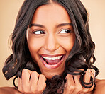 Hair care, curly beauty and woman excited in studio isolated on a brown background. Hairstyle, natural cosmetics and model thinking in salon treatment for growth, balayage and aesthetic for wellness.