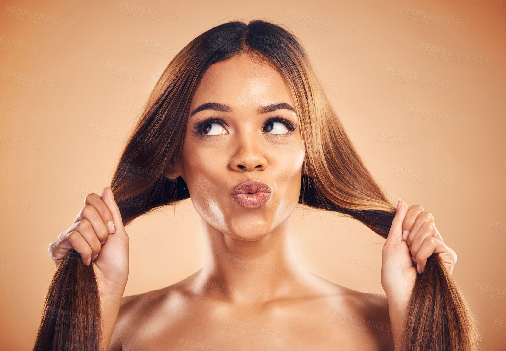 Buy stock photo Face pout, studio and woman with hair care, healthy glow and strong extensions, volume or highlights. Hairdressing salon, facial expression or model with clean shampoo hairstyle on brown background