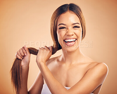 Buy stock photo Portrait, beauty and strong hair with a natural woman in studio on a brown background for shampoo treatment. Face, smile and keratin with a happy model at the salon for growth or aesthetic haircare