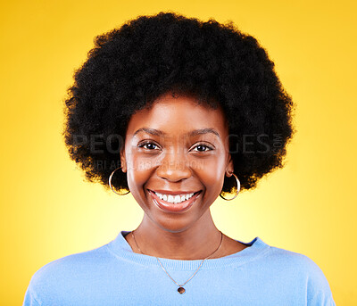 Buy stock photo Portrait, smile and young black woman in studio with afro, good mood and cool personality on yellow background. Face of happy, confident and modern African model with pride, curly natural hair or joy