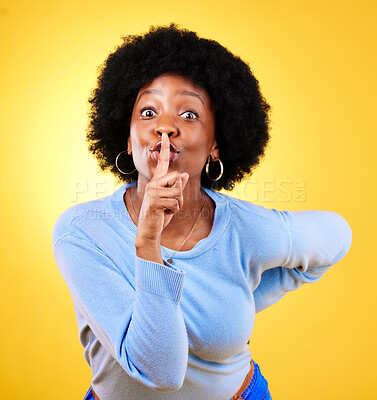 Buy stock photo Secret, portrait and black woman with finger on lips in studio for privacy, drama and surprise on yellow background. Model, quiet emoji and whisper for gossip, trust and  confidential mystery news 
