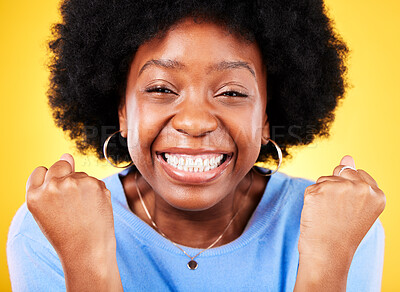 Buy stock photo Black woman, face portrait and fist for success, celebrate promotion or winning lottery bonus on yellow background. Excited model, cheers or celebration of achievement, deal or lotto winner in studio