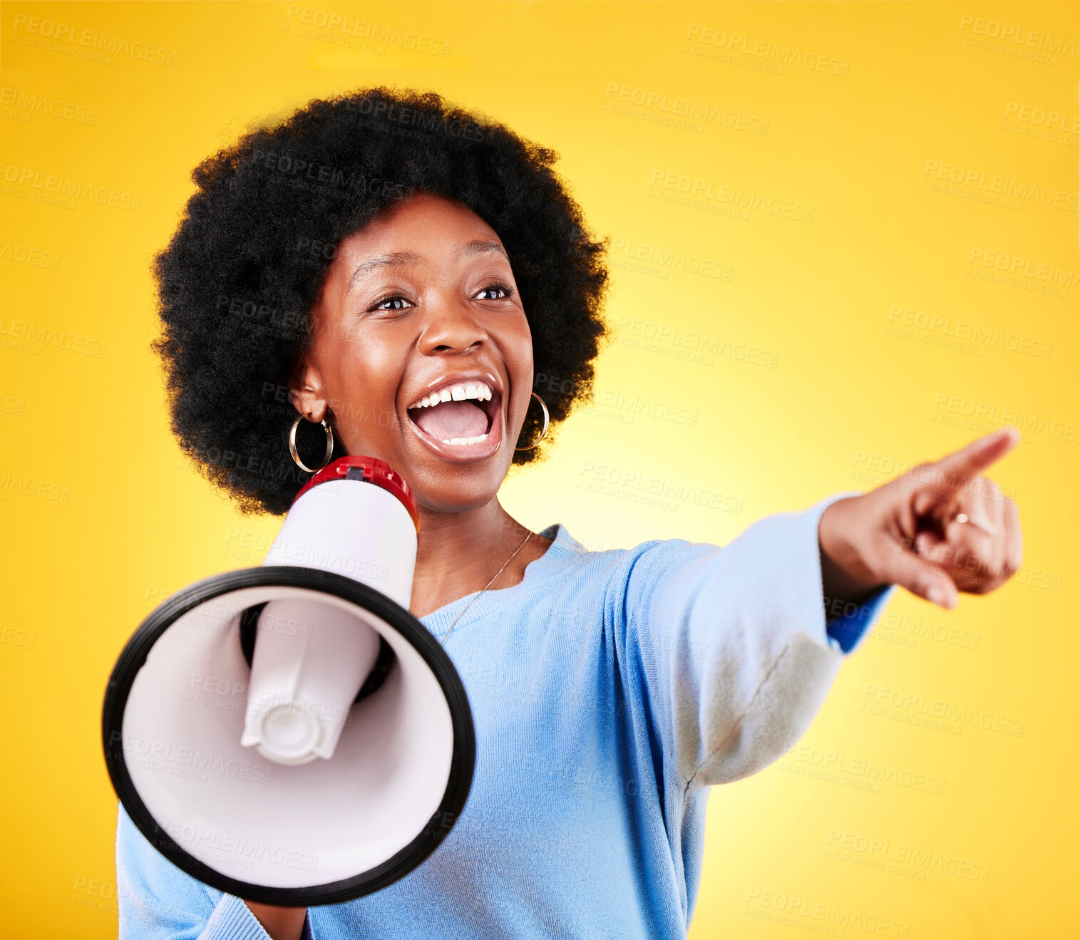 Buy stock photo Happy woman, loudspeaker or megaphone and pointing in studio for voice or announcement. African person with speaker for broadcast message, breaking news or speech communication on yellow background
