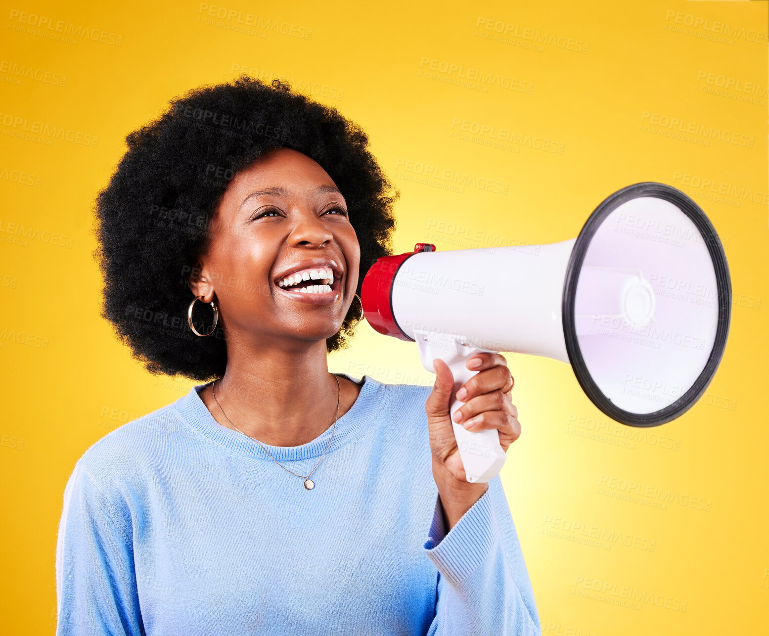 Buy stock photo Happy black woman, megaphone and voice in promotion, advertising or marketing on a yellow studio background. African female person, smile or bullhorn for loudspeaker in sale announcement or alert