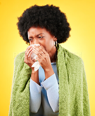 Buy stock photo Blanket, sneeze and sick woman in studio for cold, allergies or allergy of medical virus on yellow background. African model, tissue and fever of healthcare, sinusitis or bacteria of winter wellness