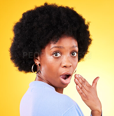 Buy stock photo Portrait, hand and face of surprised black woman in studio, shocked and wow emoji for gossip, drama or news. Person, omg and girl with afro hearing announcement and is mind blown on yellow background