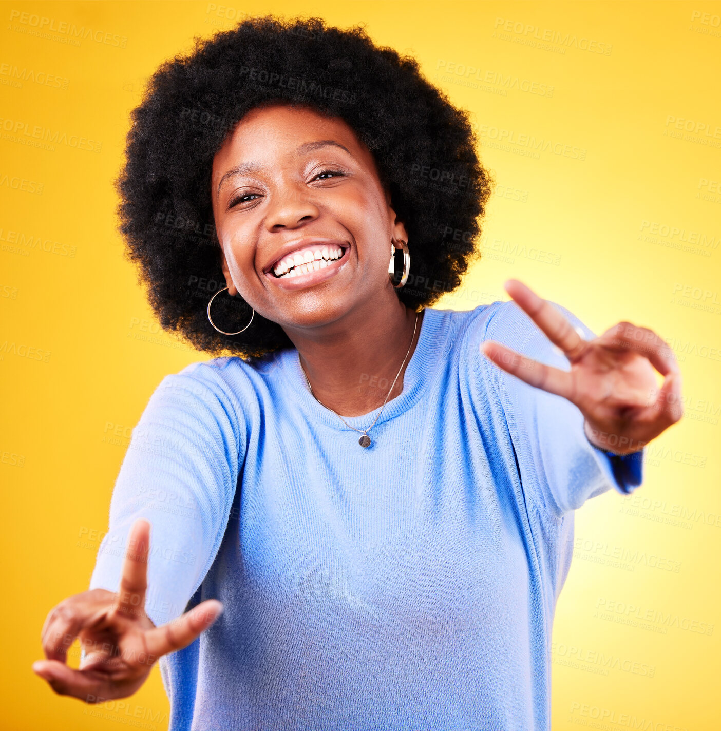 Buy stock photo Hand sign, peace and portrait of a woman in studio with fun emoji, excited face and v symbol. Happy african person on yellow background for positive mood, motivation and review with gesture or vote