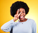Peace, tongue out and portrait of a woman in studio with fun emoji, silly face and v sign. African person on a yellow background for v symbol, motivation and review with hand gesture or vote