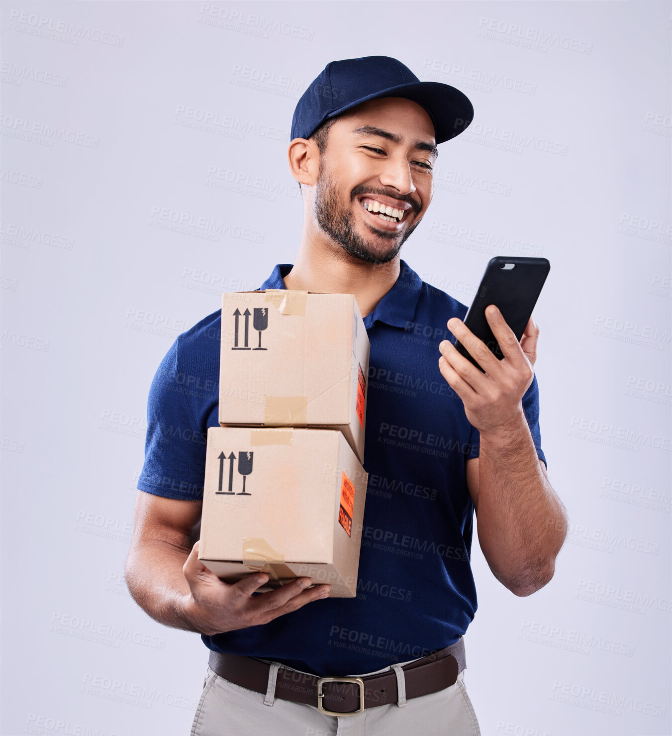 Buy stock photo Phone, studio box and laughing delivery man reading online shopping, funny retail info or commercial export sale. Supply chain package, cellphone meme or funny distribution person on white background