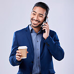 Conversation, coffee and a man on a phone call with a studio background for an idea or contact. Smile, vision and an Asian businessman with a drink and talking on a mobile for work or communication