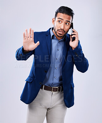 Buy stock photo Business, phone call and man with hand, stop or wait in studio for listen, attention or ask on grey background. Emoji, palm and Asian male person with smartphone conversation and icon for rejection