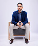 Portrait, lawyer and business man on chair in studio isolated on a white background mockup space. Professional, attorney or confident worker, legal advocate and Mexican advisor in law firm for career