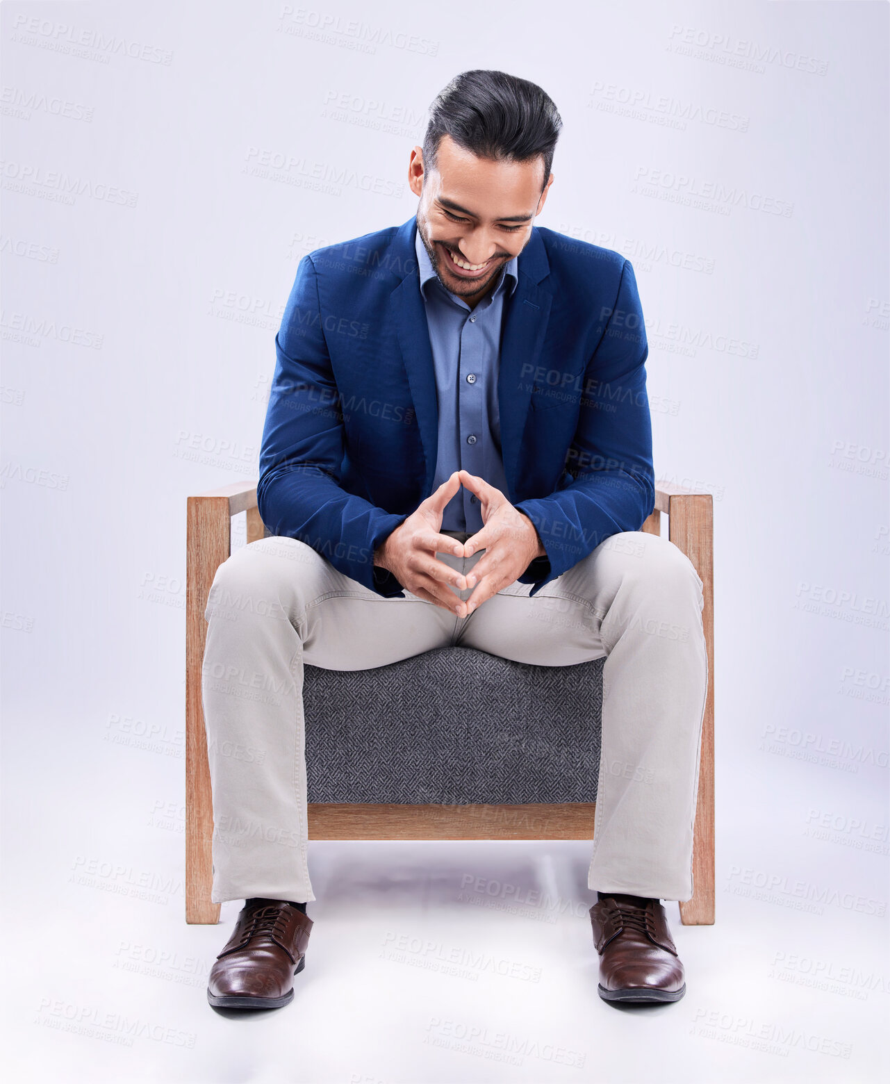 Buy stock photo Smile, professional and businessman on a chair in a studio with confidence, confidence and law career. Happy, advisor and young male attorney from Mexico sitting on sofa to relax by white background.