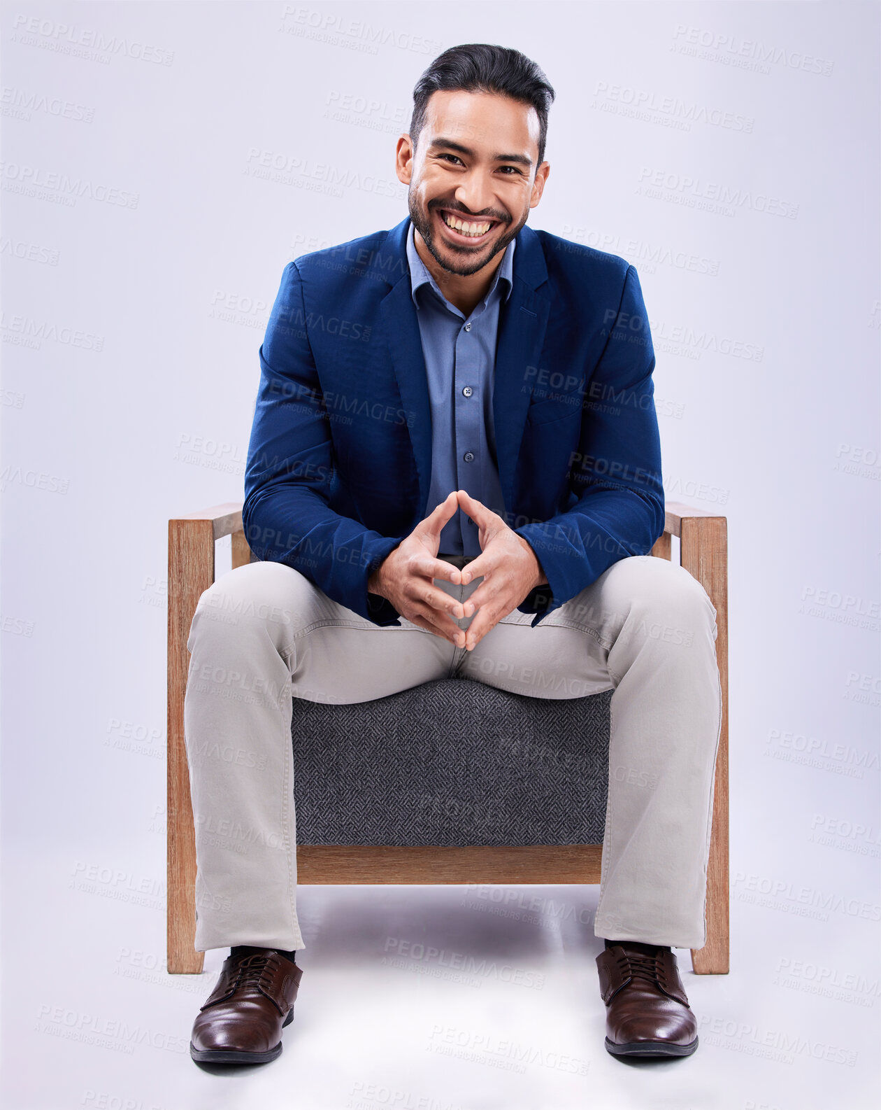 Buy stock photo Portrait, happy and business man on chair in studio isolated on a white background. Professional attorney, smile and confident lawyer, legal employee and Mexican worker in corporate suit at law firm.