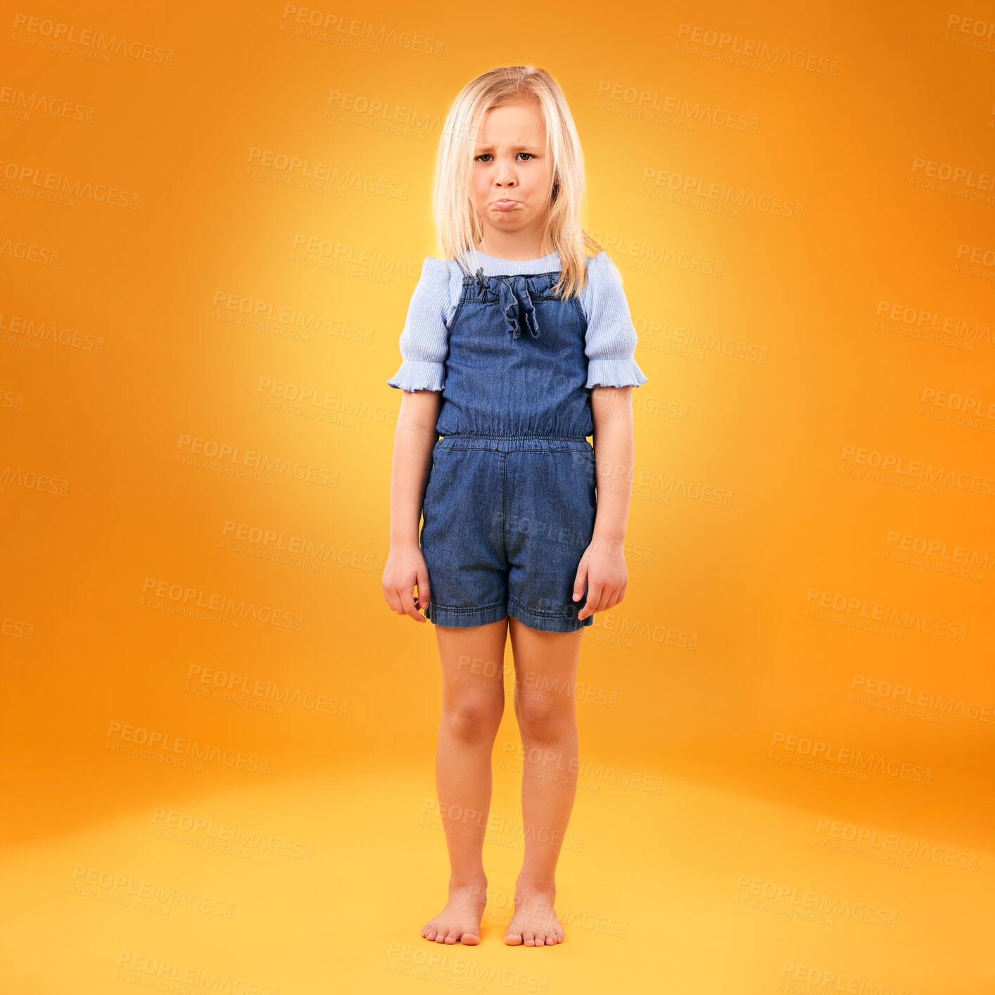 Buy stock photo Portrait, sad and girl child in studio with bad news, feedback or negative review on orange background. Face, frown and kid with emoji disappointed expression, angry or tantrum, reaction or behavior