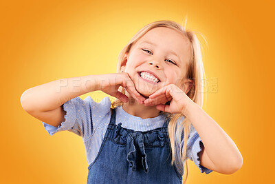 Buy stock photo Portrait, kid and girl with surprise, wow and excited with happiness on a yellow studio background. Face, person and child with announcement, giveaway and good news with a prize, smile and winner