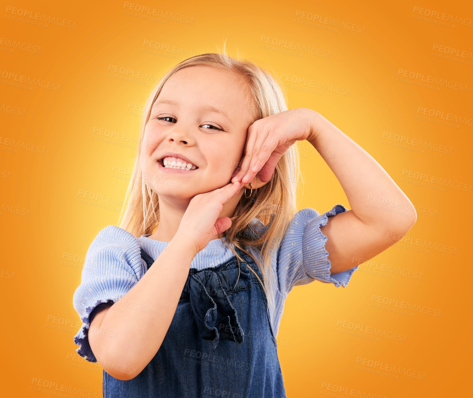 Buy stock photo Smile, cute and portrait of a child on a studio background for youth, happiness or expression. Orange, young and face of a girl kid or female model with a gesture for adorable, positive or childhood