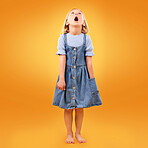 Fashion, wow and girl child in studio for news, omg or coming soon promotion on orange background. Looking up, surprise and kid shocked by choice, sale or discount, announcement or prize giveaway