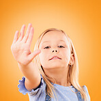 Stop, hand and portrait of girl child in studio with no, warning or vote on orange background space. Protest, palm and face of kid with emoji for control, power or voice, opinion or limit choice