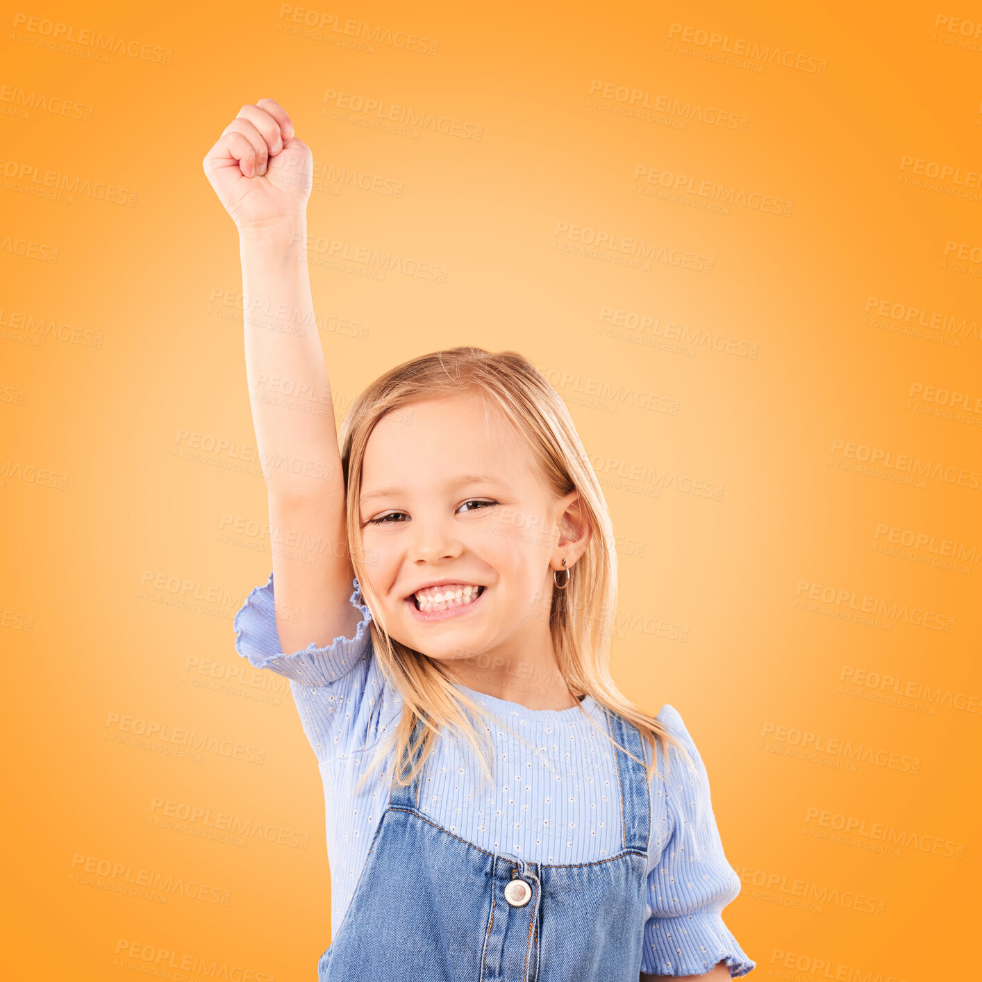 Buy stock photo Hand up, portrait and girl child in studio happy, excited and celebrating success on orange background space. Face, smile and kid winner with victory fist for good news, promotion or prize giveaway