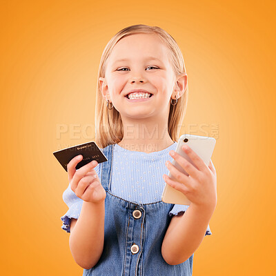 Buy stock photo Portrait, child and credit card with phone in studio for online shopping order, digital payment and fintech on orange background. Happy girl kid, smartphone and buy mobile games, sales and savings 