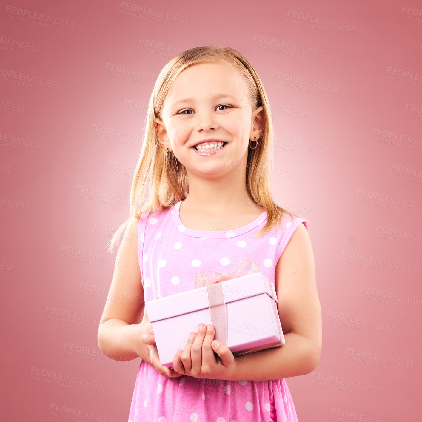 Buy stock photo Child, gift or present portrait in studio for birthday, holiday or happy celebration. Excited girl kid on a pink background with box for surprise, giveaway prize or celebrate win with smile