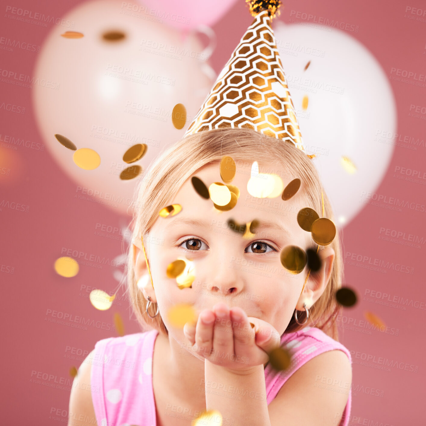 Buy stock photo Balloons, birthday and portrait of girl with confetti on pink background for party, celebration and special day. Happy, excited and young child with decoration for magic, wonder and glitter in studio