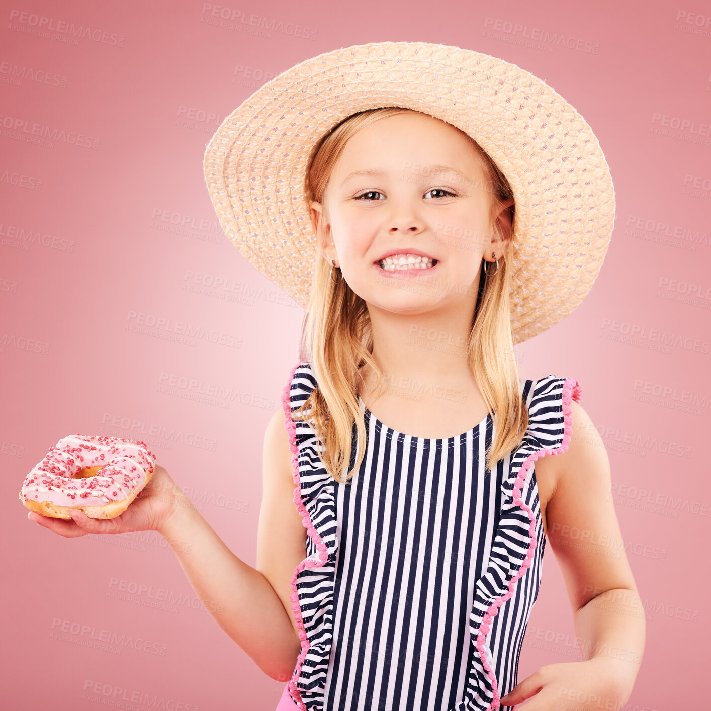 Buy stock photo Happy, portrait and girl with a donut or child with sugar, dessert and sweet craving on pink background in studio. Face, smile and hungry kid with donuts on holiday, vacation or weekend diet 