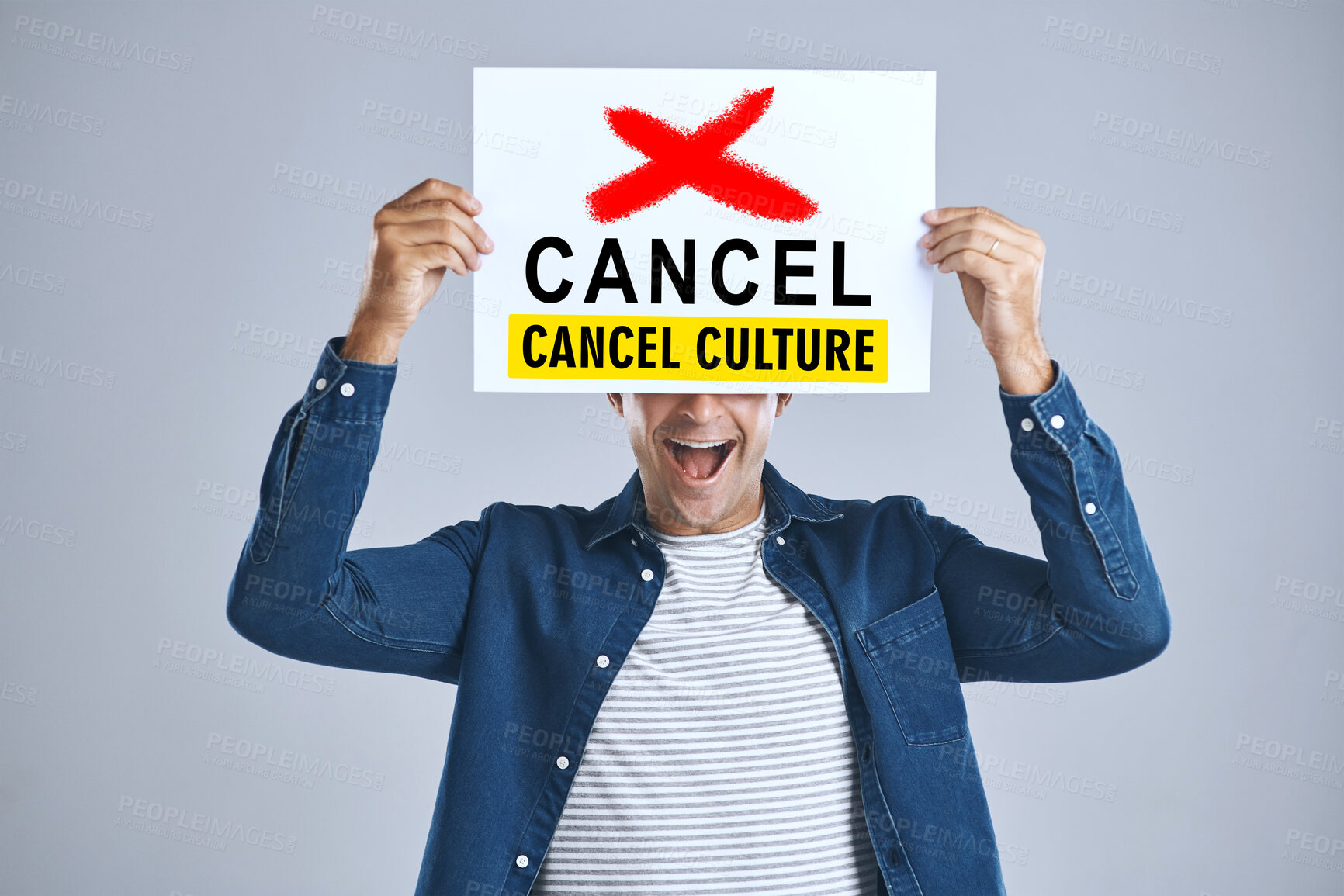 Buy stock photo Cancel culture, man and protest sign in hand with message for social media violence and support in studio. Banner, person and mouth with mockup space for solidarity and opinion on grey background