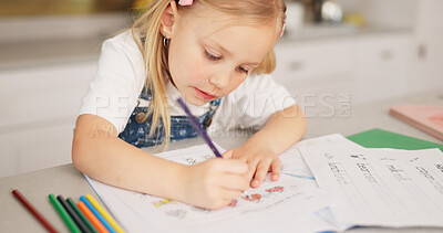 Buy stock photo Education, homeschool and child writing, color and learning for development, growth and kindergarten homework. Home study, drawing and happy girl with school project in notebook on kitchen counter.