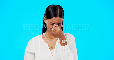 Buy stock photo Business woman, headache and eye pain with migraine, allergy and stress in studio. Female professional, health problem and tired from anxiety with mistake, fatigue and work fail in blue background