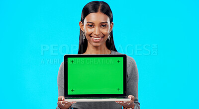 Buy stock photo Portrait, woman and green screen space on laptop for advertising, sign up offer and info in studio. Happy indian model, computer and tracking markers for newsletter, review or deal on blue background