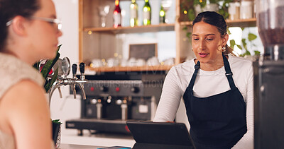 Buy stock photo Women, barista or customer order at cafe for service, payment or order on counter at coffee shop. Serving, waitress or employee in small business restaurant helping a girl client at checkout or work