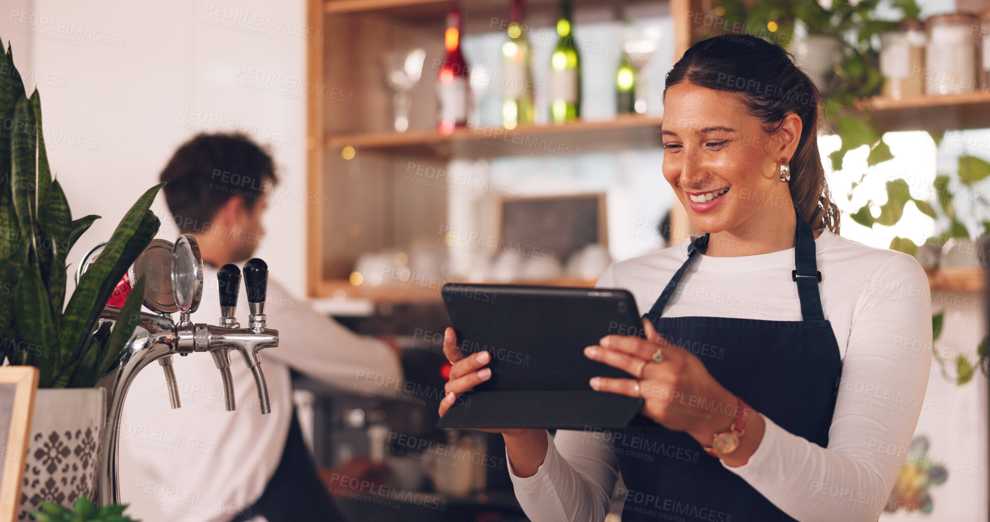 Buy stock photo Happy woman, cafe or barista on tablet for small business owner, social media update or sales promotion. Waitress, startup or person laughing on technology for coffee shop news or restaurant online