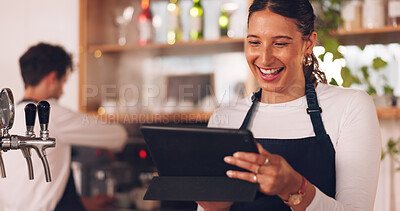 Buy stock photo Happy woman, restaurant or barista on tablet for small business owner, social media update or sales promotion. Waitress, startup or person laughing on technology for coffee shop news or cafe online