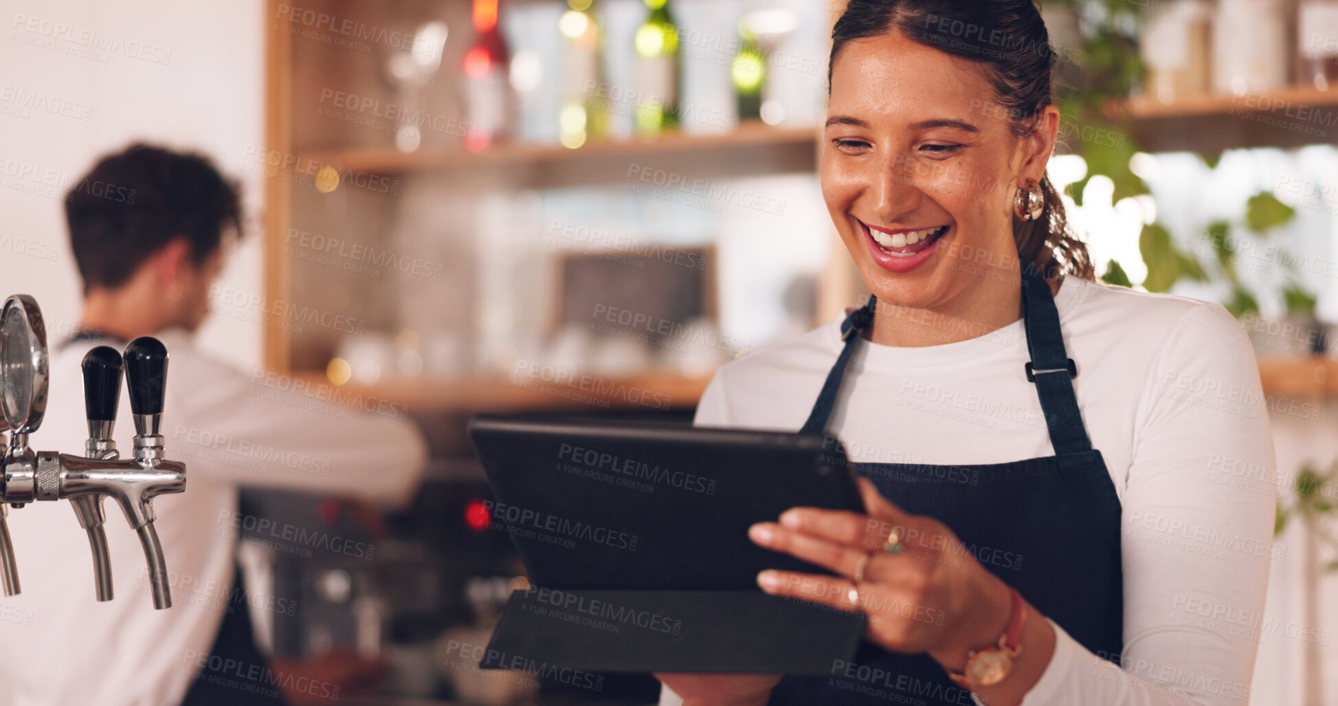 Buy stock photo Happy woman, restaurant or barista on tablet for small business owner, social media update or sales promotion. Waitress, startup or person laughing on technology for coffee shop news or cafe online