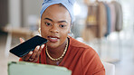 Phone call, office and business woman in discussion while doing research for a corporate project. Cellphone, professional and African female employee on a mobile conversation in the modern workplace.