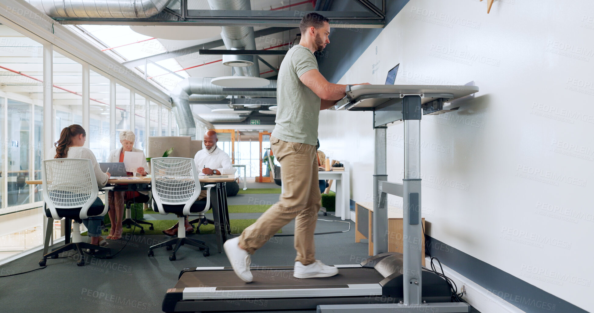 Buy stock photo Man, walking and treadmill with a businessman in the breakroom of his office for exercise or mobility. Fitness, health or corporate with a male employee in staying active in the workplace