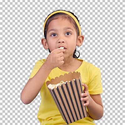 Popcorn, eating and focus with girl in studio for food, cinema and relax. Television, movie and film with child and snack for streaming service, subscription and tv isolated on blue background