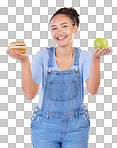 Happy, portrait and woman with burger, apple and choice in studio isolated on a blue background. Smile, fruit and person with sandwich, fast food or comparison for healthy diet, nutrition or wellness