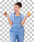 Portrait, excited and woman with donut, orange and choice in studio isolated on blue background. Happy, fruit or person with doughnut, fast food or comparison for healthy diet, nutrition or wellness