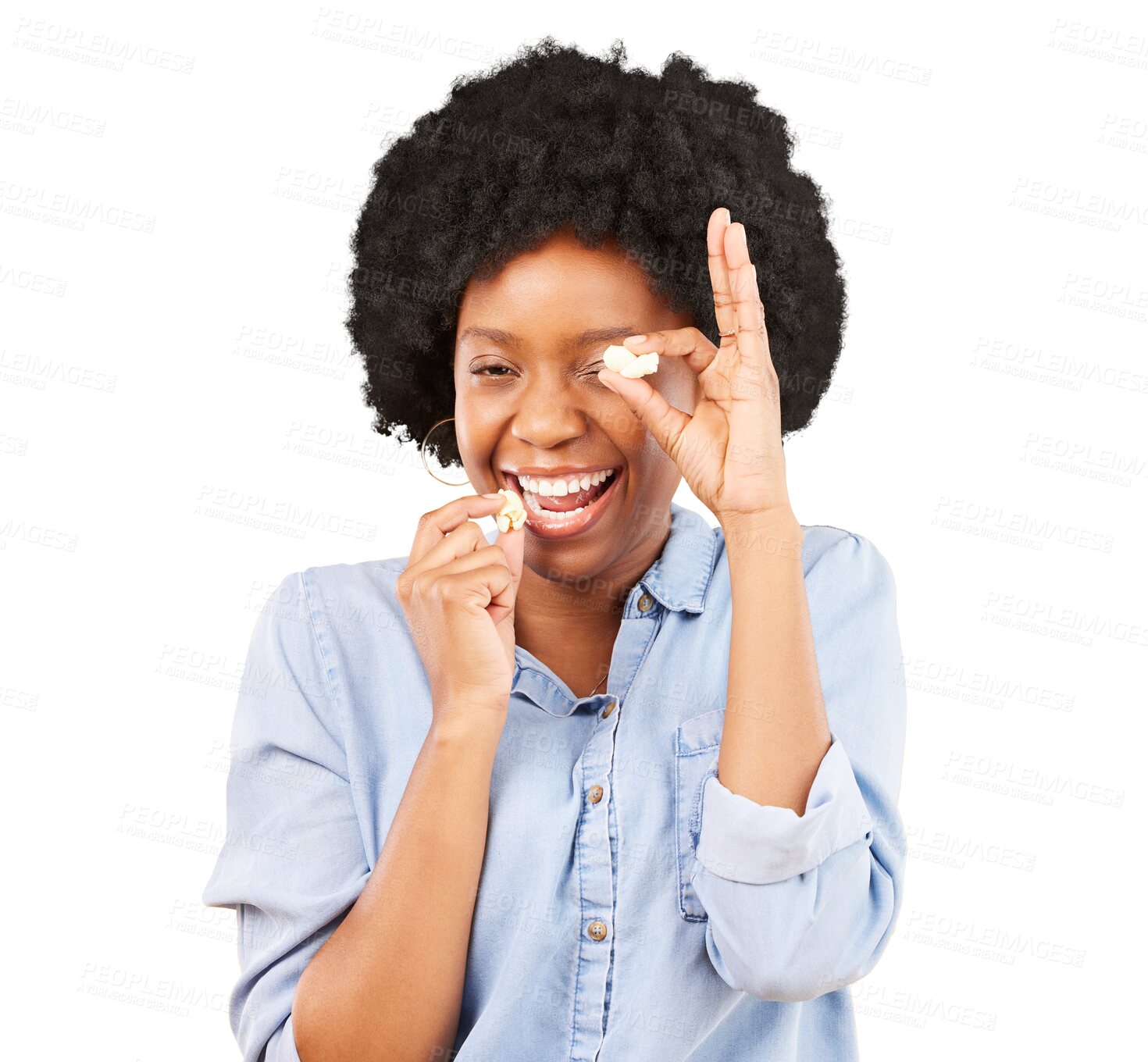 Buy stock photo Black woman, funny face and eating popcorn with portrait, smile and model isolated on a transparent background. Face, person or African girl with a snack, humor and happiness with food, treat and png