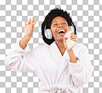 Black woman, music headphones and singing with phone in studio isolated on a yellow background. Karaoke singer, bathrobe and happy female dance with mobile microphone while streaming podcast or radio