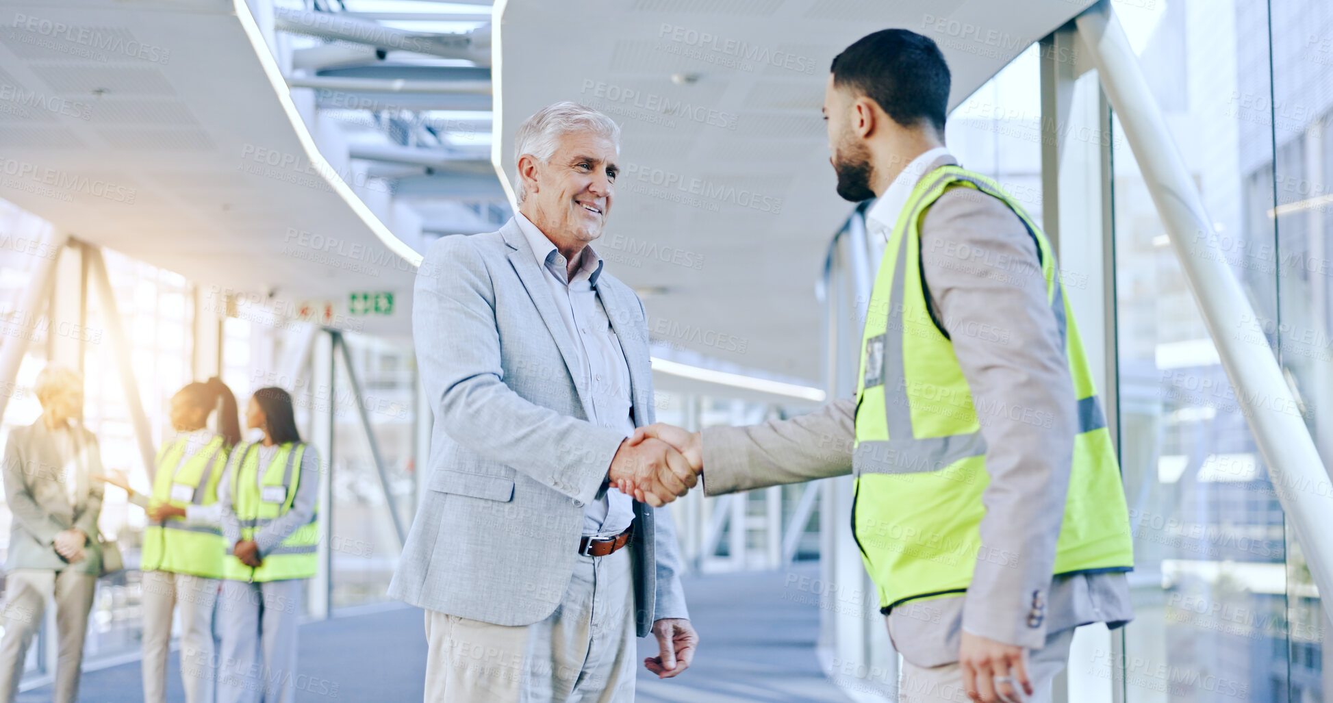 Buy stock photo Business man, architect and shaking hands with smile for partnership, deal or agreement for building construction. CEO, handshake and contractor with respect, hiring and recruitment for architecture