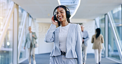Headphones, music and business woman dance in office walking with celebration for weekend. Company, female worker and web radio listening to audio feeling happy with freedom and web song with smile